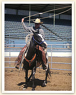 Matt on horse twirling rope